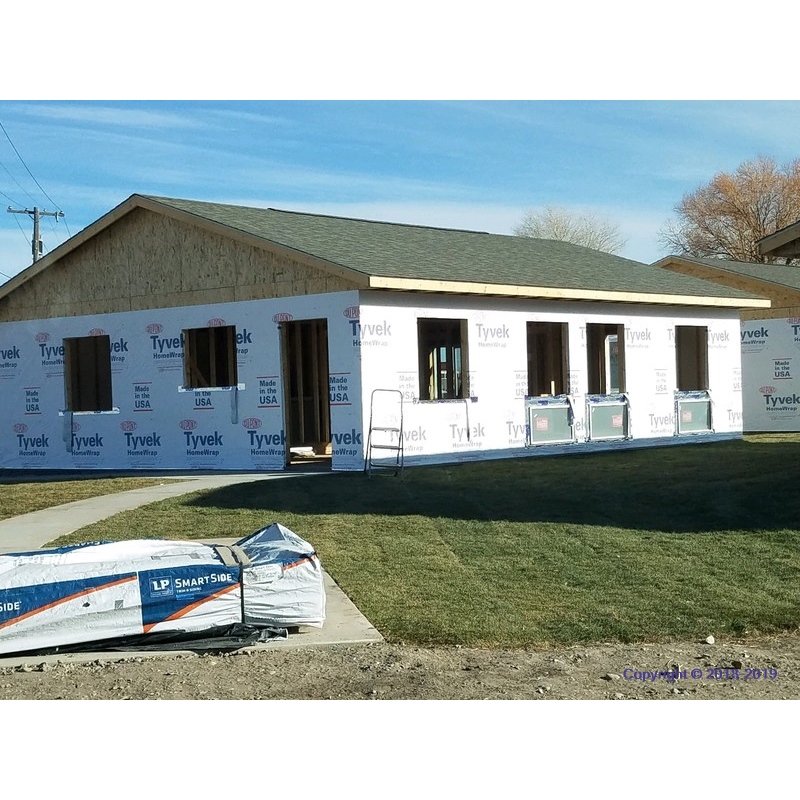 Building site - lawn is in and green, first windows installed