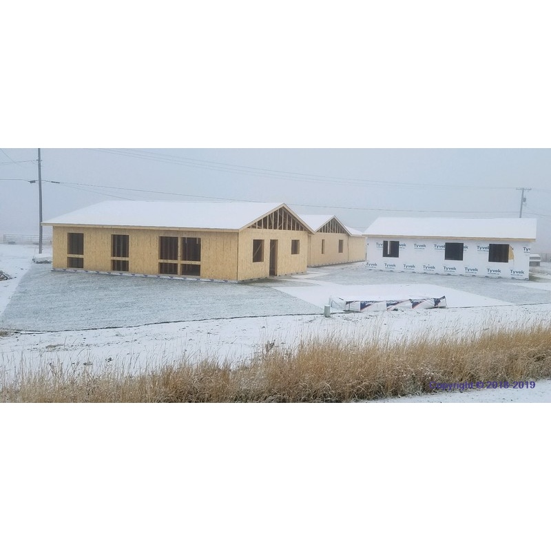 Building site - Roofs on, lawn is in, covered with snow